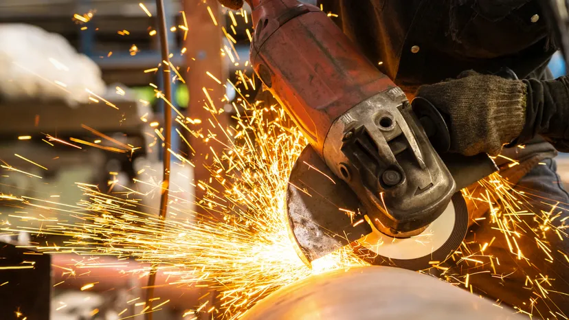 Abrasives and cutting tools - angle grinder in action with sparks flying