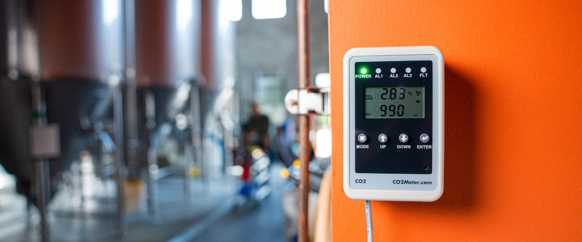 Industrial gas detectors - digital CO2 meter with display showing readings in industrial setting