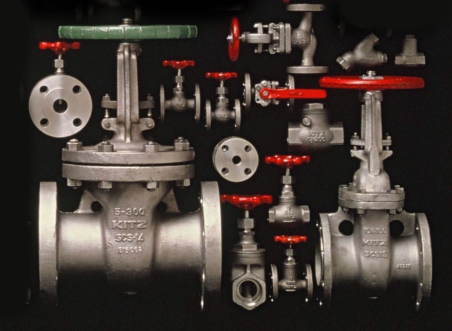Fluid control valves - industrial stainless steel valves with red handles and flanged connections
